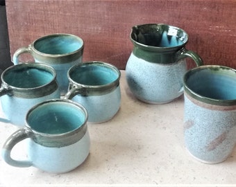 Turquoise and green ceramic mugs