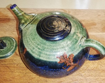 Oak leaf decorated stoneware teapot with alternative lids for fun