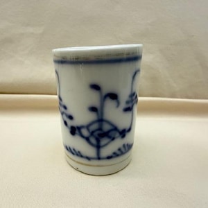 May include: A set of three ceramic nesting bowls in graduating sizes. The bowls are white with a speckled, textured finish and feature a slightly flared rim. Ideal for food preparation or serving.