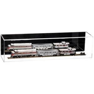 May include: A clear acrylic display case showcasing a model train set. The set includes several silver and red locomotives and freight cars on miniature tracks. The case is rectangular and provides a clear view of the train models.