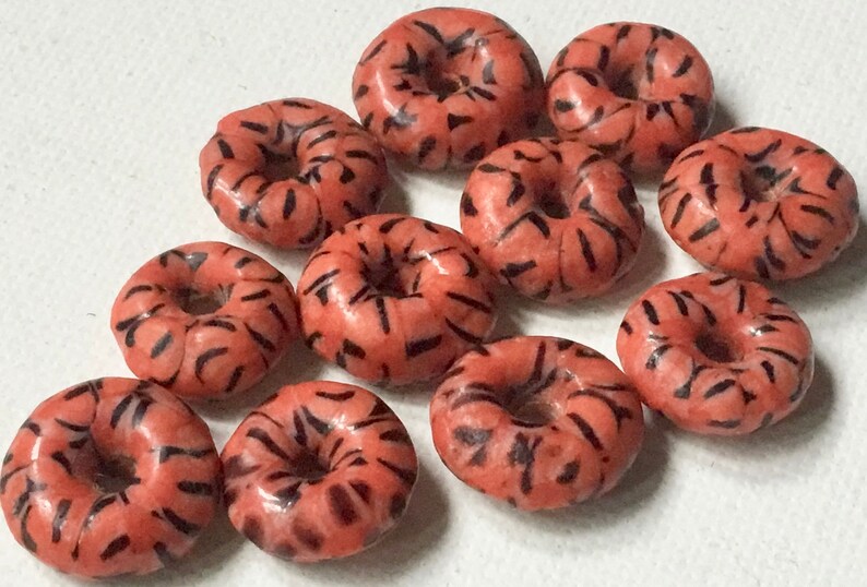 Fair Trade from Ghana Pack of 11 Beads Size 15mm approx Red Recycled Glass Disc Spacer Beads with Black Design