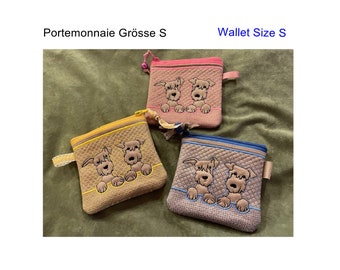 May include: Three small zippered wallets with a quilted fabric exterior. Each wallet features an embroidered design of two dogs peeking over the top. The wallets are in pink, yellow, and brown with blue trim.