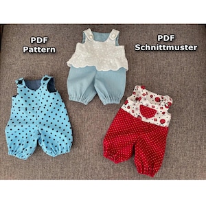 Könnte beinhalten: Drei Baby-Strampler in verschiedenen Designs. Einer ist hellblau mit schwarzen Punkten, ein anderer hellblau mit weißem Oberteil, und der dritte ist rot mit weißen Punkten und einem Marienkäfermuster. Der Text "PDF Pattern" und "PDF Schnittmuster" sind sichtbar.