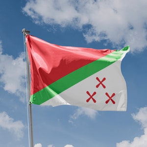May include: A red, white, and green flag with three red crosses on a white field. The flag is waving in the wind against a blue sky with white clouds.
