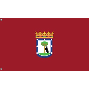 May include: A red flag with a blue and white shield featuring a green tree and a black bear. The shield is topped with a gold crown.