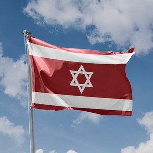 Puede incluir: Una bandera roja con una estrella blanca de seis puntas en el centro, ondeando al viento contra un cielo azul con nubes blancas.