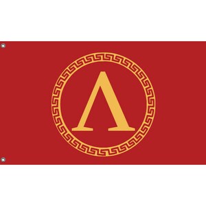 May include: A red flag with a gold circle containing a stylized golden letter A, surrounded by a gold Greek key pattern.