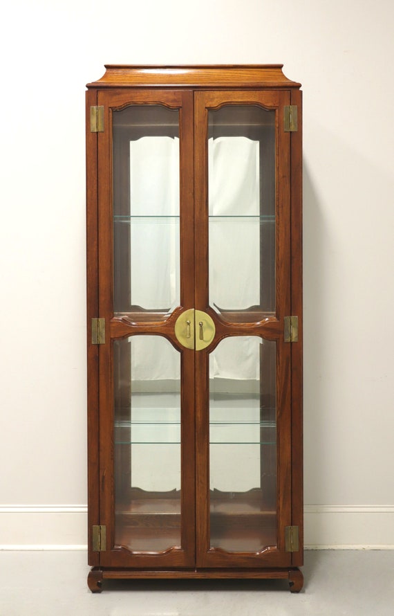 Lighted curio cabinets online with glass doors