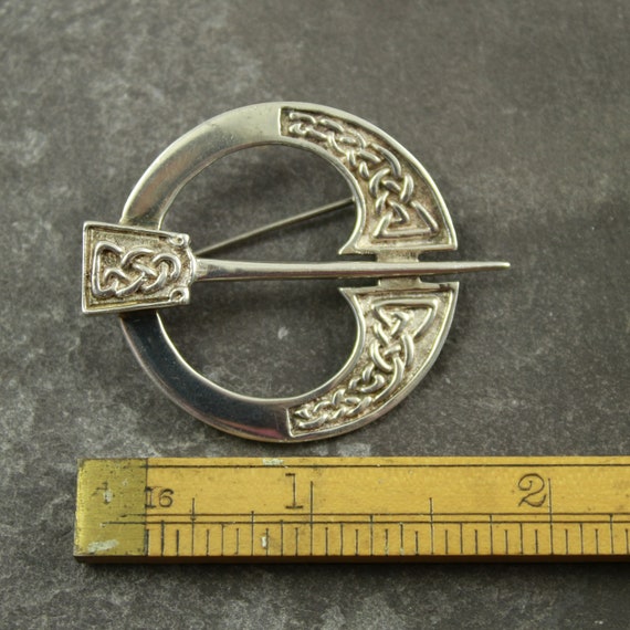 Penannular style silver brooch with Celtic knot d… - image 7