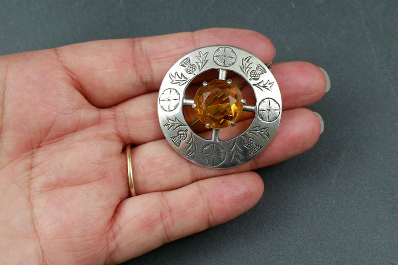 Scottish thistle brooch with citrine sterling silver hallmarked Glasgow Robert Allison 1950s mid century traditional plaid pin Scotland