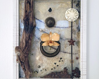 nostalgia. layered assemblage collage featuring natural and man-made objects: driftwood, micah, scrap metal, hardware, jewelry, and more.