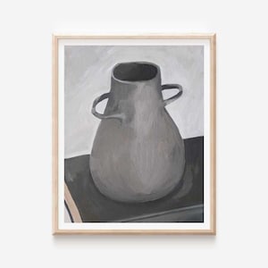 May include: A framed painting of a grey vase with two handles. The vase is set against a grey and white background. The painting is in a wooden frame.