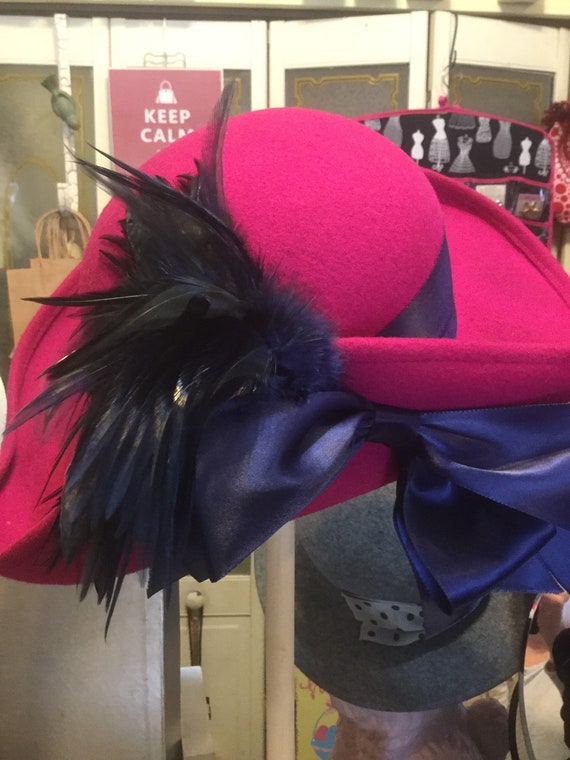 Fuchsia felt hat with navy blue accents