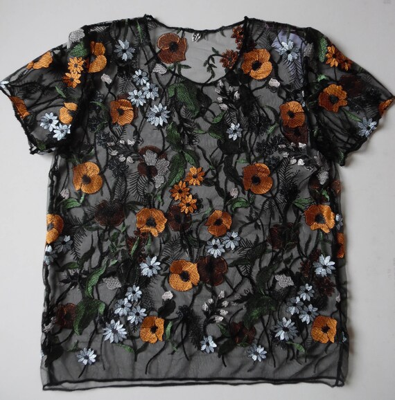 black mesh top with embroidered flowers