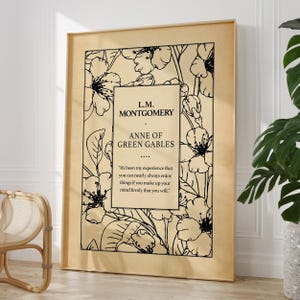 Framed Anne of Green Gables quote print held side view in cosy living room