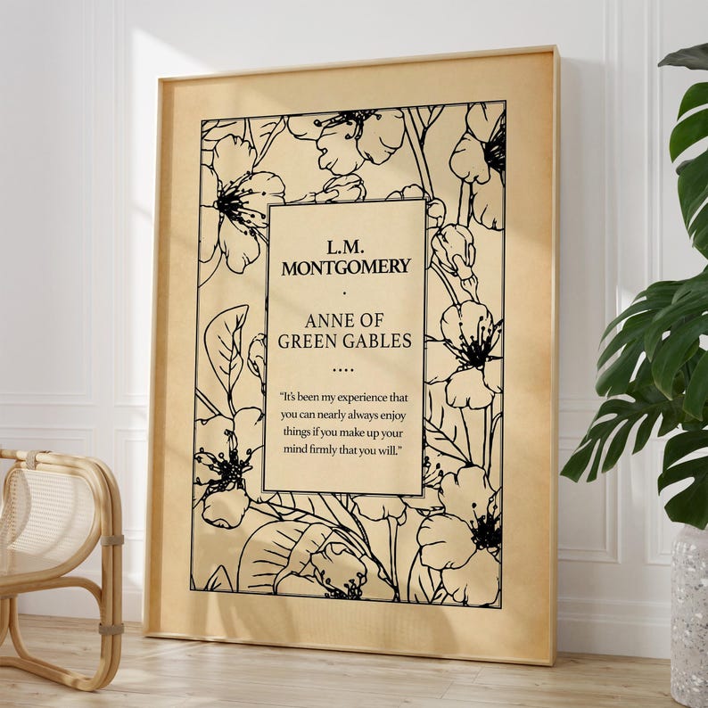Framed Anne of Green Gables quote print held side view in cosy living room