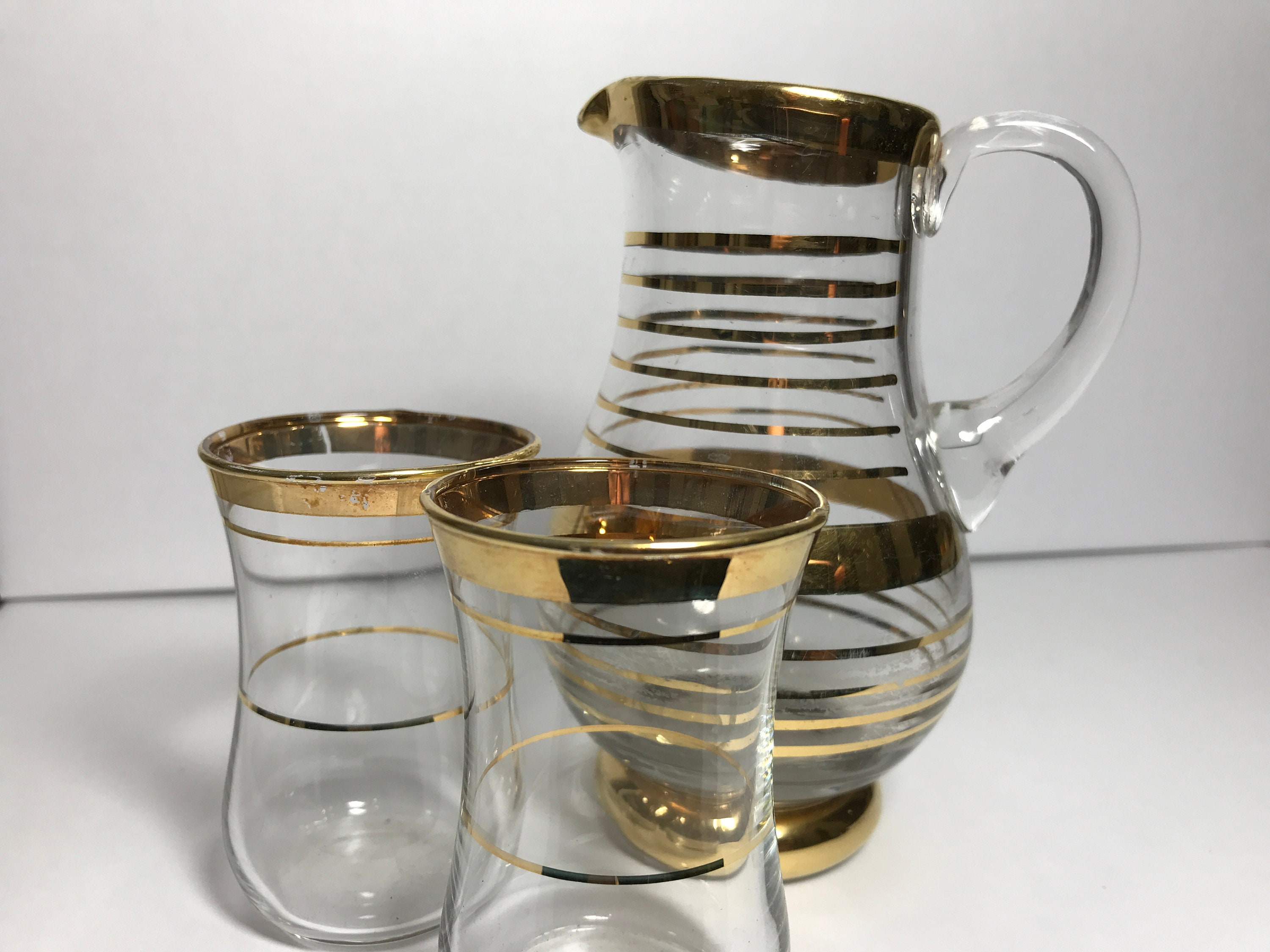 Gold Rimmed Glass Cordial Jug and Pair of Drinking Beakers Set