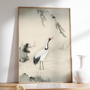 Japanese Crane Woodblock Illustration. Inspired by traditional Japanese art, this detailed reproduction captures the elegance of the crane—symbol of longevity and good fortune—making it a meaningful and eye-catching addition to any interior.