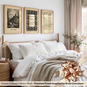 a cozy bedroom with a bed, framed prints on the wall, and a decorative bow on the bed.