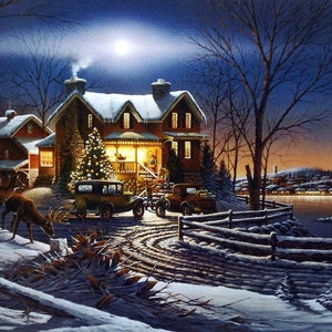 May include: A snowy winter scene with a two-story house decorated for Christmas. The house has a porch with a lit Christmas tree and a red roof. Two vintage cars are parked in front of the house. There are two deer in the foreground.