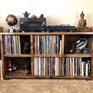 turntable stand receiver shelf, hififurniture with large floor speakers full of vinyl records