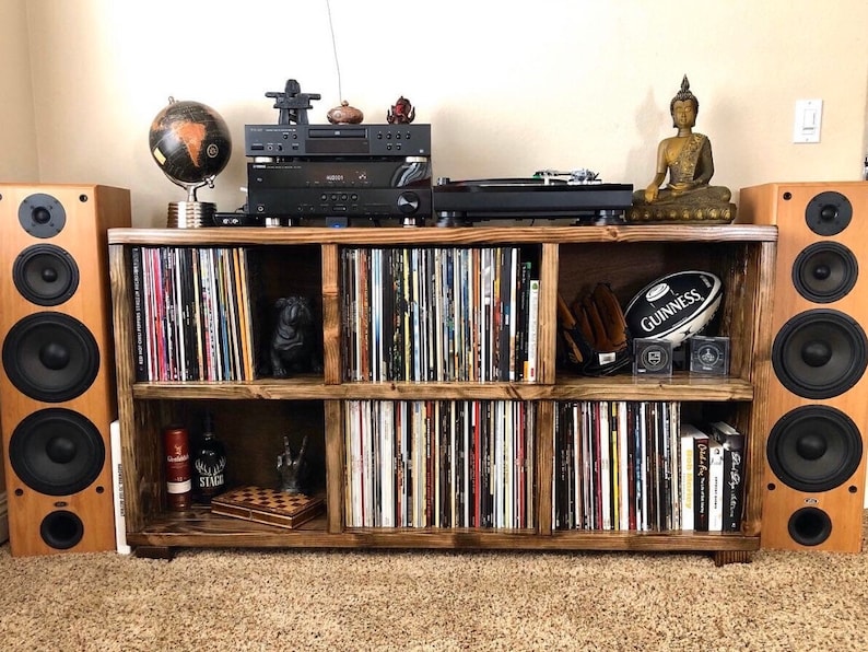turntable stand receiver shelf, hififurniture with large floor speakers full of vinyl records
