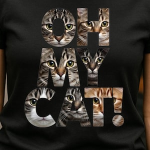 Könnte beinhalten: Schwarzes T-Shirt mit dem Schriftzug "OH MY CAT!" in einer einzigartigen Schriftart, wobei jeder Buchstabe mit einem Nahaufnahme-Gesicht einer Katze gefüllt ist. Das Design zeigt verschiedene Katzenrassen und -farben und erzeugt eine verspielte Grafik.