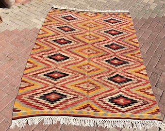 Vintage Turkish rug, 84" x 60", pale orange kilim, rugs, area rug, bohemian rug, eccentric rug, kelim, kilim, orange kilim, flatweave, 795x