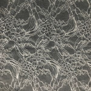 May include: White lace fabric with a delicate floral pattern.