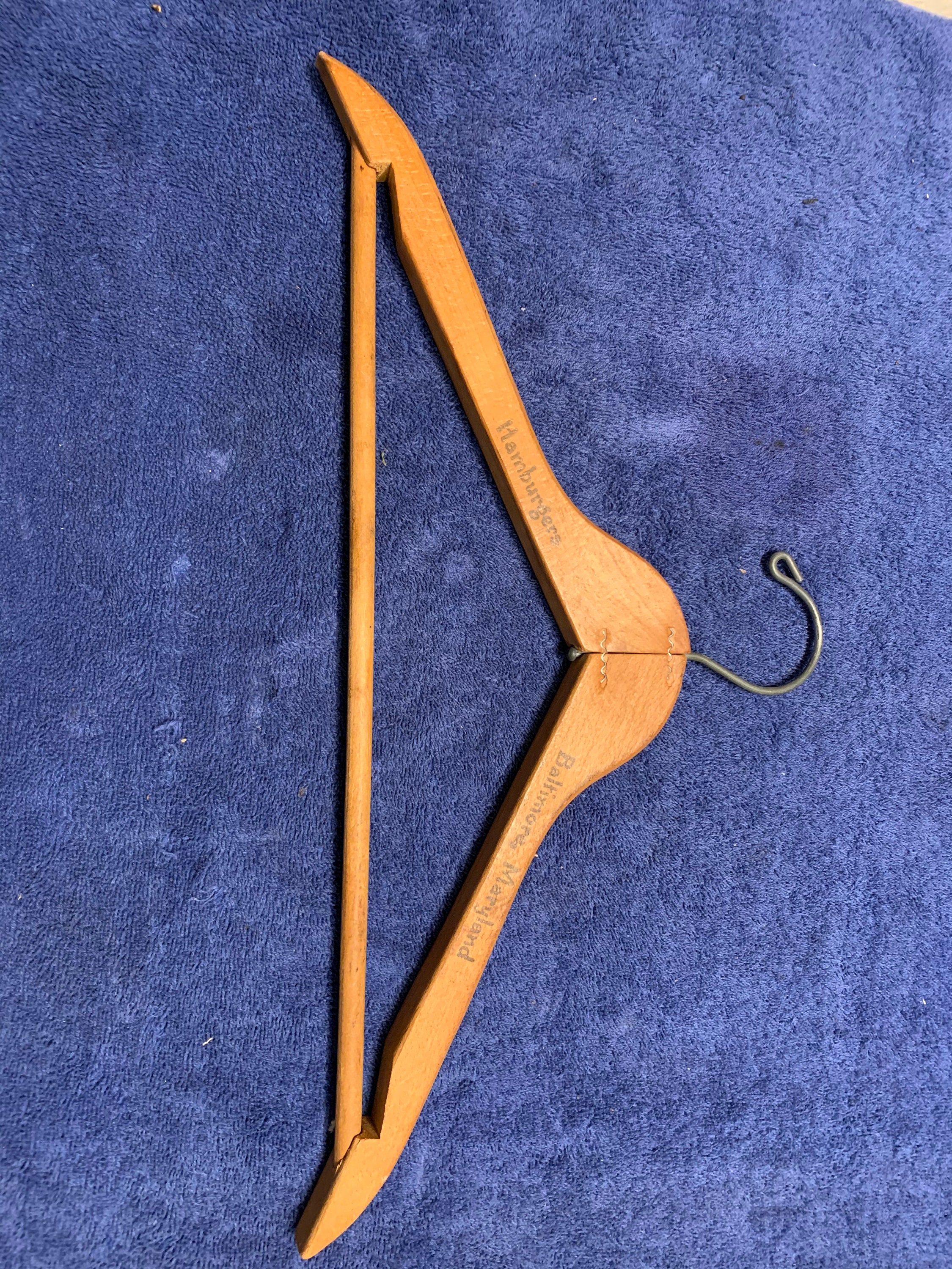 Up for sale is a vintage wooden hanger from 1960. Hamburgers Baltimore MD.