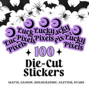 May include: A set of 100 purple die-cut stickers with a black crescent moon and the text "Luck Pixels" in a retro font. The stickers are surrounded by black bats and spiders.