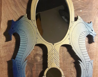 Egyptian inspired handheld mirror