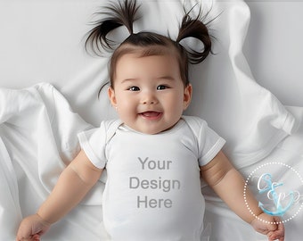 White onesie mockup, happy baby girl model wearing infant bodysuit, minimalist kid stock photo on white bed, asian model, kid t-shirt mockup