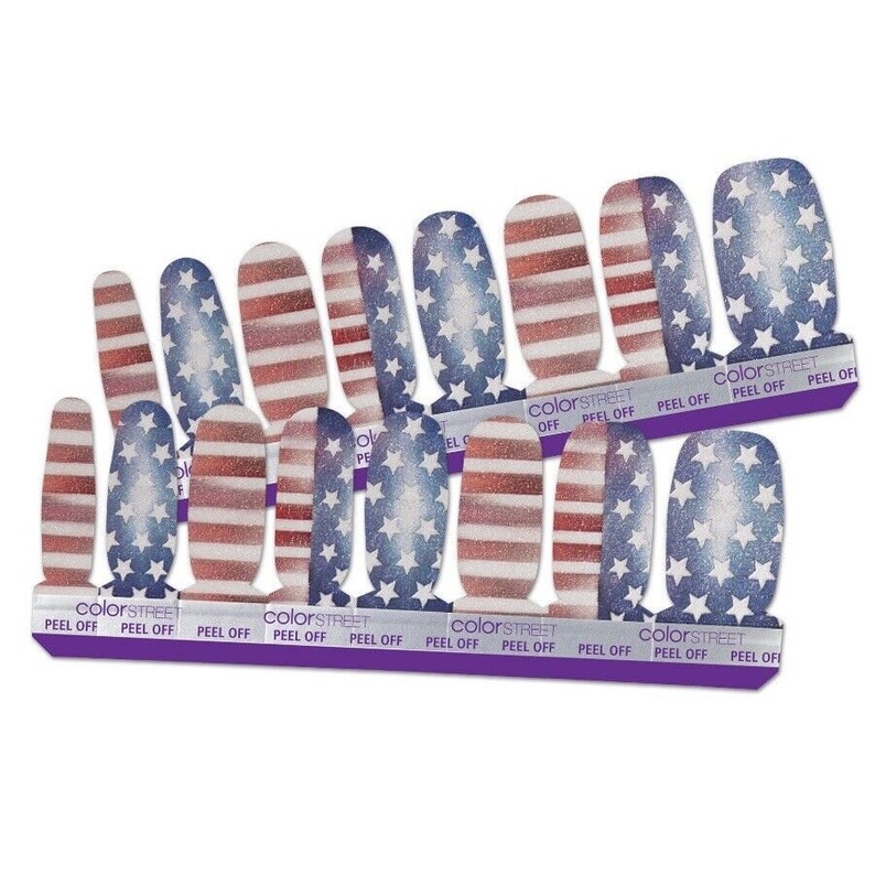 May include: A set of 10 nail polish wraps featuring a red, white and blue American flag design with glitter accents. The wraps are labelled "Color Street" and "Peel Off".