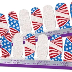 May include: A set of 10 nail polish wraps featuring a red, white and blue American flag design with glitter. The wraps are labelled "Color Street" and "Peel Off".