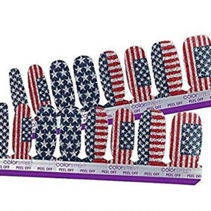 May include: A set of 10 nail polish strips featuring a glittery American flag design. The strips are labelled "Color Street" and "Peel Off".