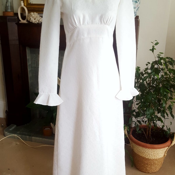 A late 60s early 70s gorgeous off white maxi dress or wedding dress with sweetest lily of the valley self print