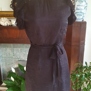 Stunning classic 80s LBD black dress with backless and frill design