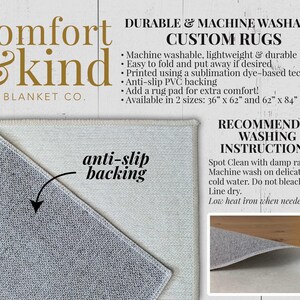 May include: A white and gray rug with the text "comfort & kind BLANKET CO." in gold lettering. The rug has an anti-slip backing and is machine washable. The text "DURABLE & MACHINE WASHABLE CUSTOM RUGS" is in black lettering. The text "RECOMMENDED WASHING INSTRUCTIONS" is in black lettering. The text "Spot Clean with damp rag. Machine wash on delicate using cold water. Do not bleach. Line dry. Low heat iron when needed." is in black lettering.