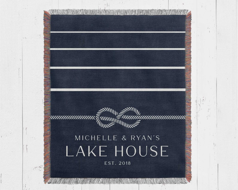 custom blue and white lakehouse woven throw blanket personalized with family name and established year