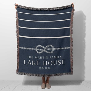 custom blue and white lakehouse woven throw blanket personalized with family name and established year