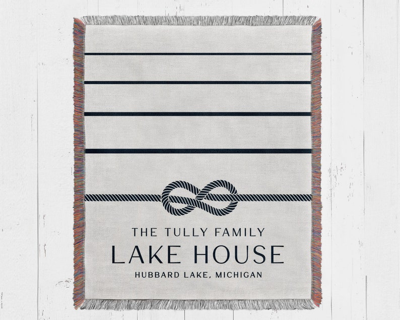 custom blue and white lakehouse woven throw blanket personalized with family name and established year