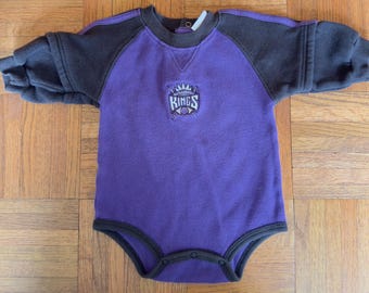 Vintage Sacramento Kings Infant Bodysuit Onesie | 12 Months Purple & Black Fleece Crewneck Baby Romper | Retro NBA Basketball