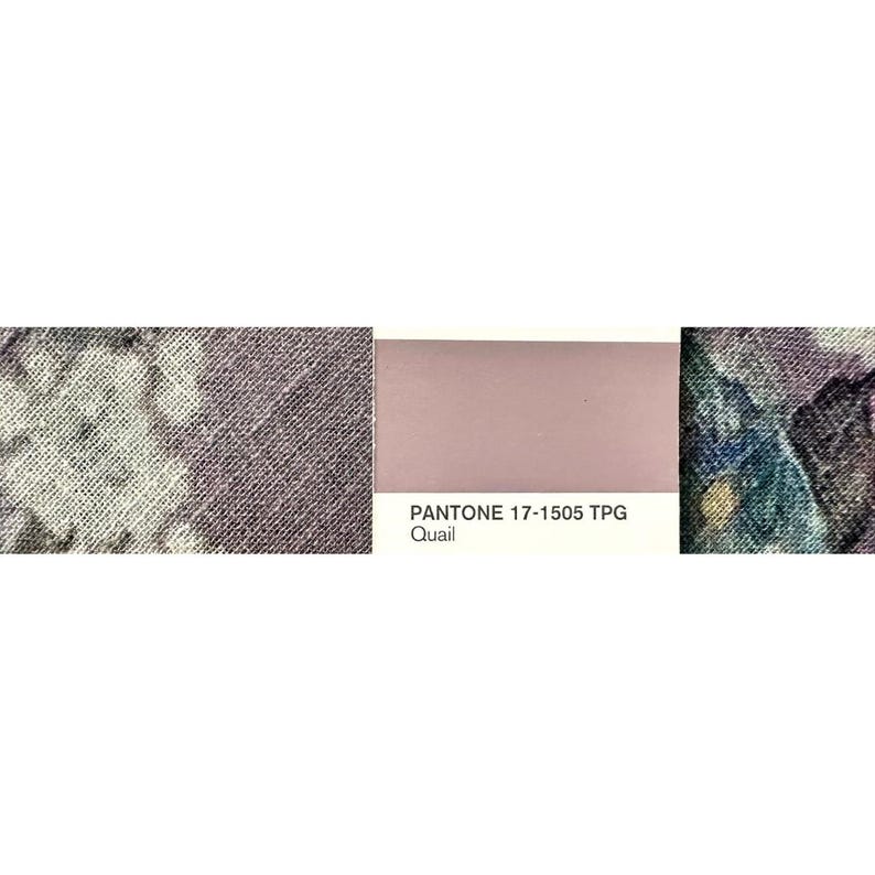May include: A color palette featuring fabric swatches and a Pantone color card. The fabric swatches display floral patterns in shades of gray, purple, and blue. The Pantone card shows the color "Quail" with the code 17-1505 TPG.