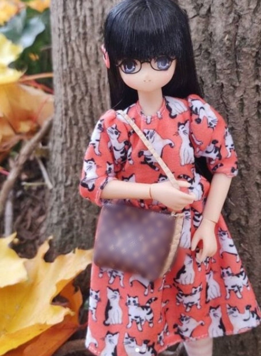 Barbie doll size chic Louis Vuitton print bag listed December 28th