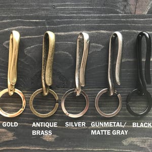 Leather wrap brass carabiner clip with whistle and key cover