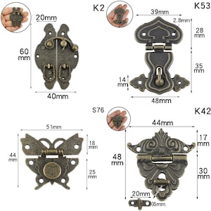 Pode incluir: Conjunto de fechos de trava de lat&atilde;o de estilo antigo com designs intrincados. Os fechos est&atilde;o dispon&iacute;veis em v&aacute;rias formas, incluindo borboleta, cora&ccedil;&atilde;o e volutas ornamentadas. Cada fecho apresenta um design detalhado e mede aproximadamente 5-8 cm de comprimento.