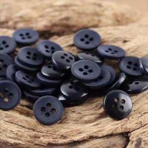 dress shirt buttons replacement Amazon.com: ButtonMode Replacement Shirt Buttons for Dress Shirt, Buttonup, Buttondown, Blouse, 22pc Set Has 8 Front (11mm or 7/16 in), 7 Sleeve (10mm or 3/8 in) & 7 Collar (9mm or Almost 3/8 in), Black