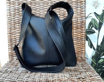Vegan leather Ink Black hobo handbag with adjustable strap for shoulder or crossbody wear.  hobo slouch bucket bag capsule wardrobe