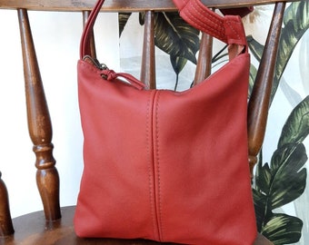 Snapdragon Red Genuine Leather crossbody handbag in 100% Leather, hobo style in small, medium, large